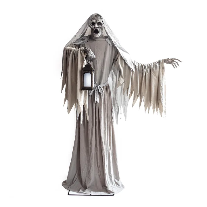 Freestanding ghost display holding a lantern