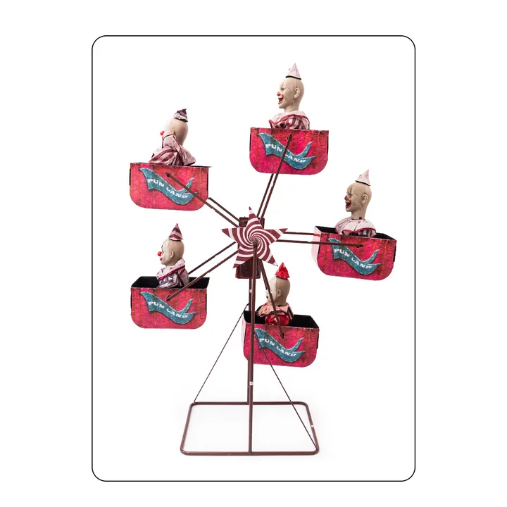 Rotating carnival-themed mechanical display prop